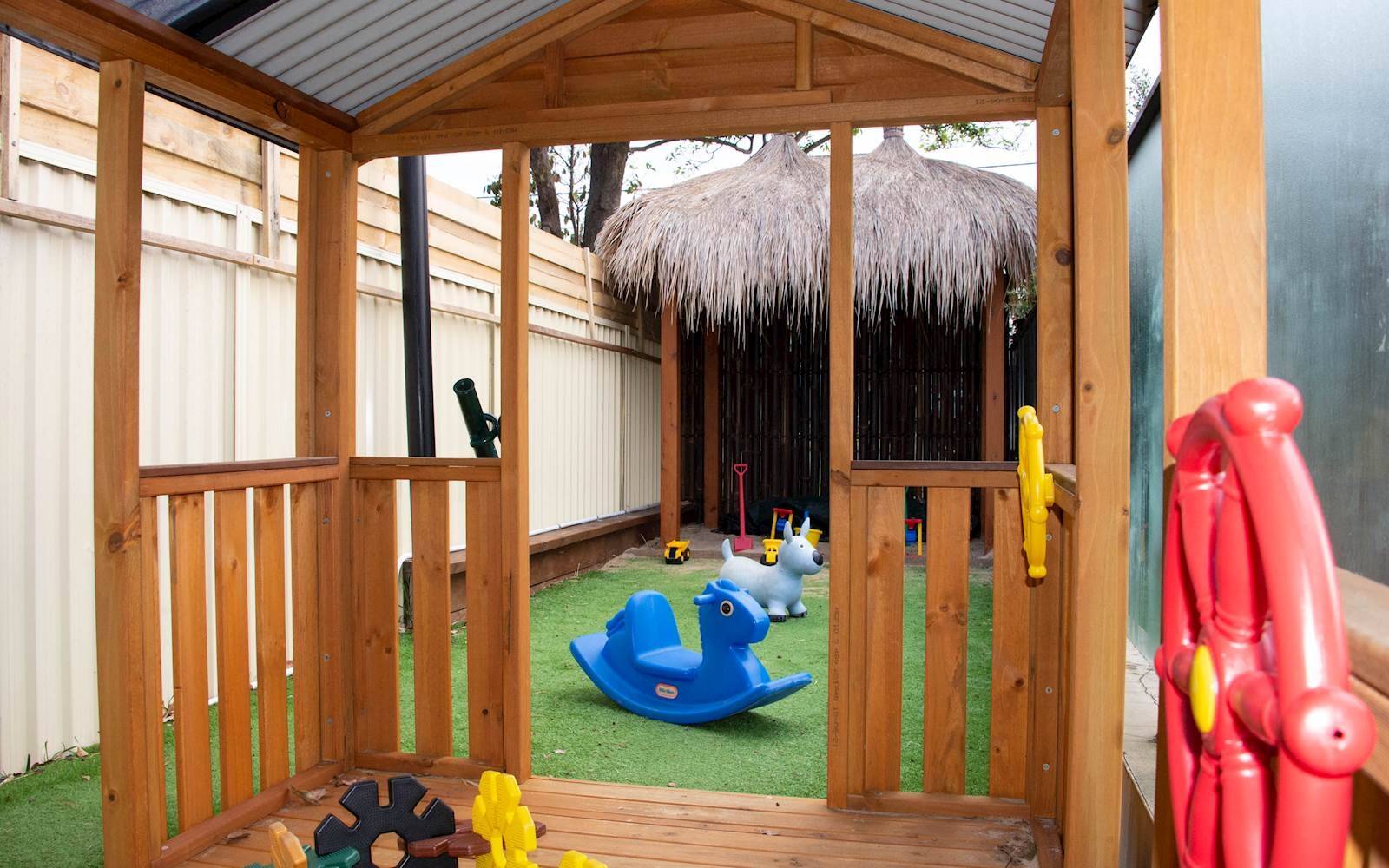 Early learning sale centre wooden playhouse